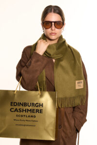 A model styled in a DC Classic scarf