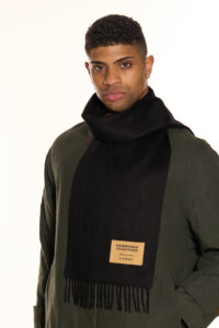 A close-up of the 140g cashmere weave, showing the density and high-quality finish of the fabric.