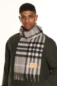 Curated Valentine’s Day display showing multiple scarves styled as luxury gifts