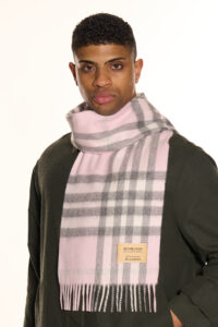 A light brown cashmere scarf neatly presented in a stylish gift box.