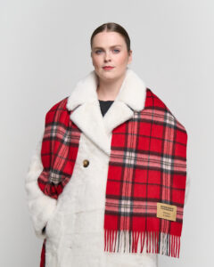 A cream cashmere scarf in a beautifully crafted gift box.